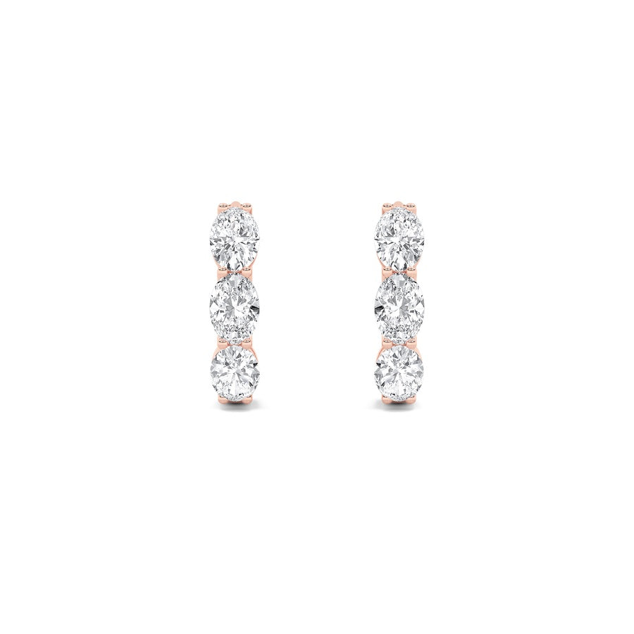 3CTW Oval Shaped Lab Grown Diamond (F/VS) Three Stone Huggie Earrings in 14K Gold
