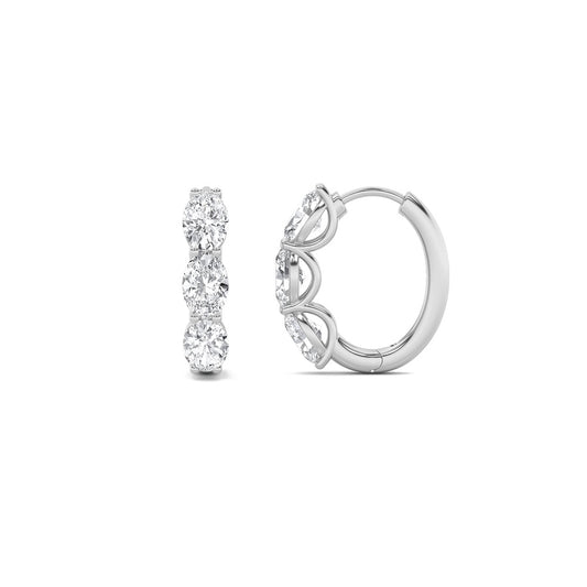 3CTW Oval Shaped Lab Grown Diamond (F/VS) Three Stone Huggie Earrings in 14K Gold