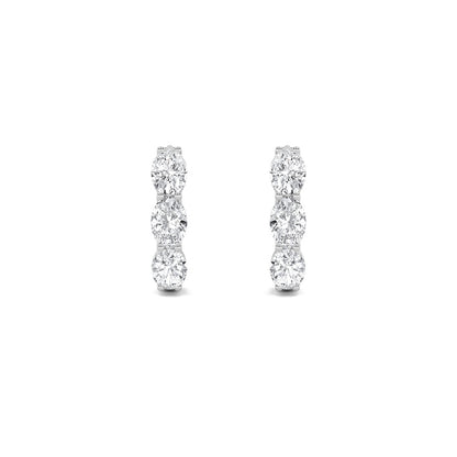 3CTW Oval Shaped Lab Grown Diamond (F/VS) Three Stone Huggie Earrings in 14K Gold