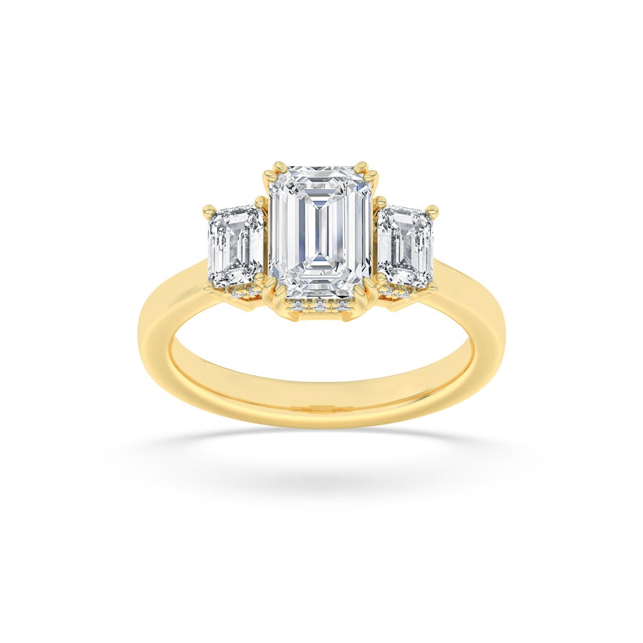 3CTW Emerald Shaped Lab Grown Diamond (F/VS) Three Stone Accented Ring in 14K Gold