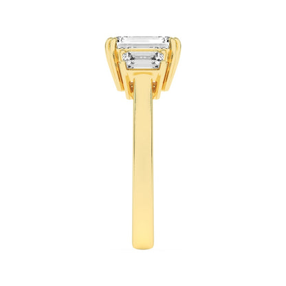 3CTW Emerald Shaped Lab Grown Diamond (F/VS) Three Stone Accented Ring in 14K Gold