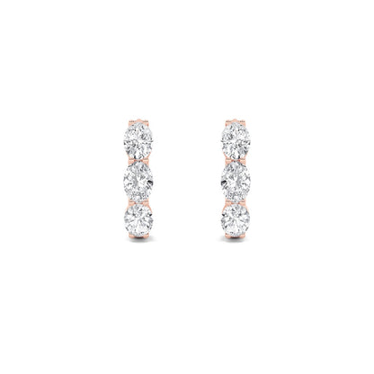 3CTW Oval Shaped Lab Grown Diamond (F/VS) Three Stone Huggie Earrings in 14K Gold